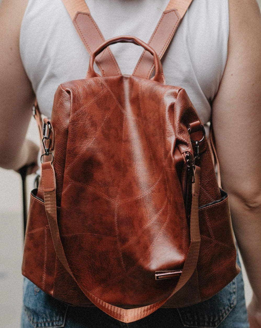 amazon anti theft backpack leather is selling a $105 anti-theft for only $30 that's perfect for your next spring trip theft leather backpack Anti-Theft Backpack The Clever